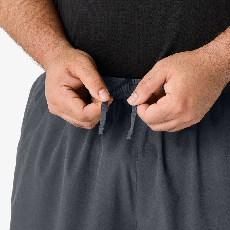 Asics Pantaloni de trening ASICS CORE WOVEN PANT 