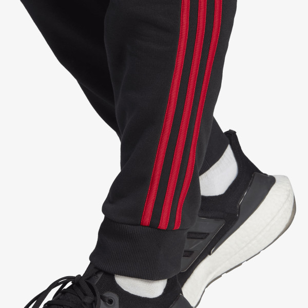 adidas Pantaloni de trening MANCHESTER UNITED FC DNA 