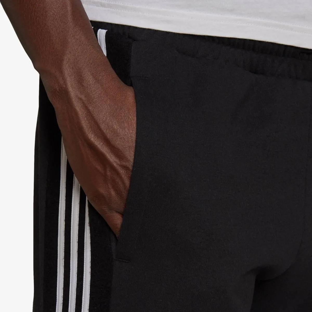 adidas Pantaloni de trening COLOR BLOCK REGULAR TAPERED 